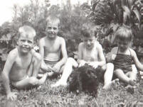 Playing in the Backyard with Brother, Sister and a Friend